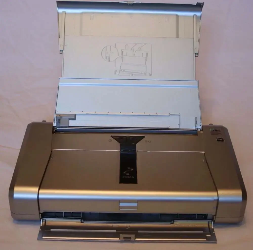 Canon PIXMA iP100 Portable Inkjet Photo Printer, Model K10296